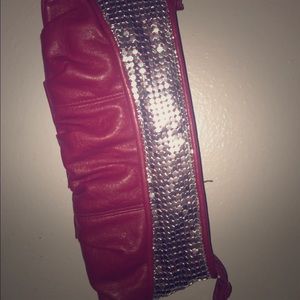 Red and silver clutch purse.