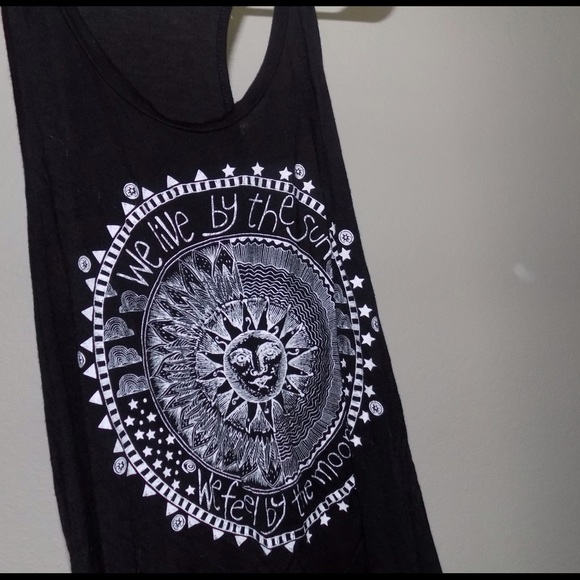 We live by the sun, we feel by the moon top