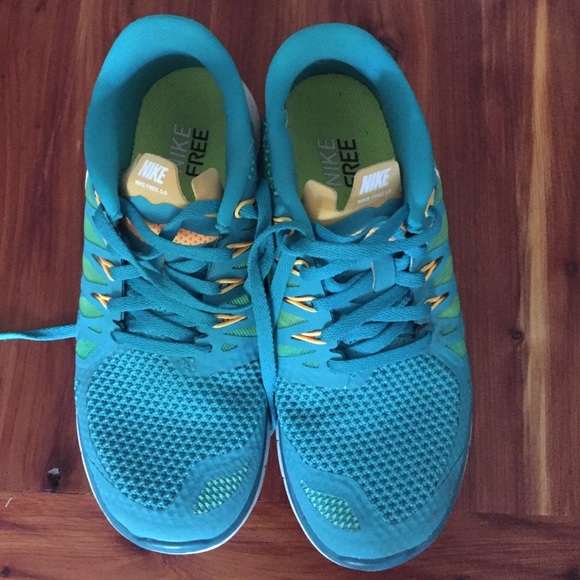 Blue Nike tennis shoes