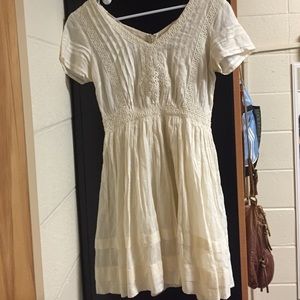Lacey, flowy white dress