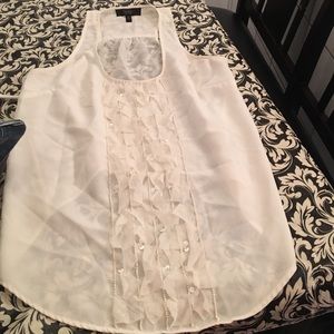 Sleeveless beige shirt