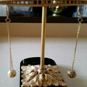 Beaded Earring. Gold in color.