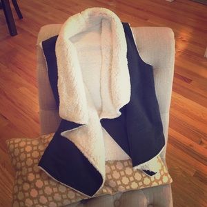 White faux fur and gray cotton vest