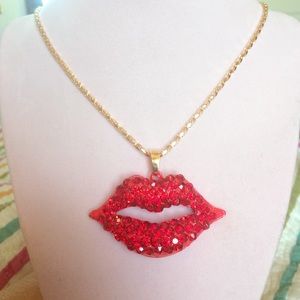 Red rhinestones lips necklace on gold chain