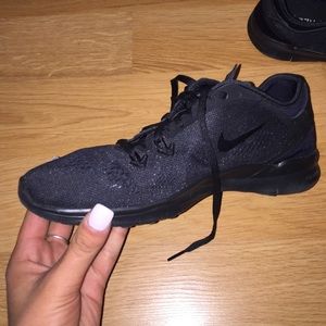 All black Nike 5.0