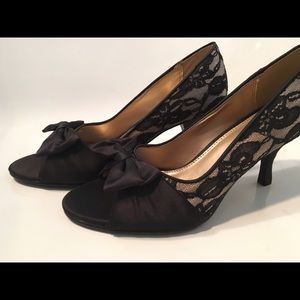 Never worn black and gold lace pumps