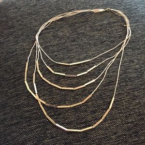 Gold multi strand necklace