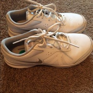 White Nike running shoes