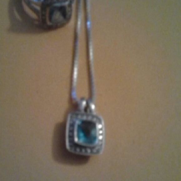 Solid Sterling silver with aquamarine stone