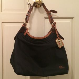 Dooney and Bourke black nylon tote lined with pink
