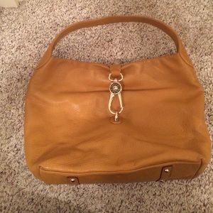 Dooney and Bourke camel tote with reversible clasp