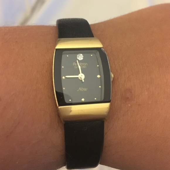 Black and gold watch