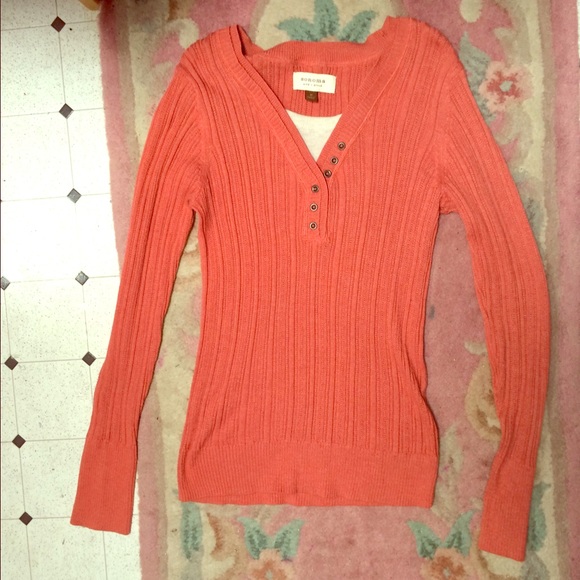 Orange sweater with white modesty panel
