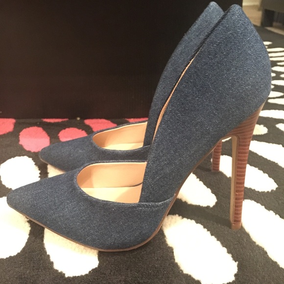 Brand new denim heels. Size 7.