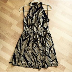 En Creme Black and Gold Dress