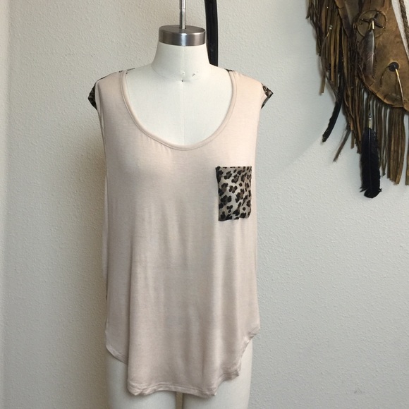 Sleeveless top knit front woven back