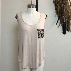 Sleeveless top knit front woven back