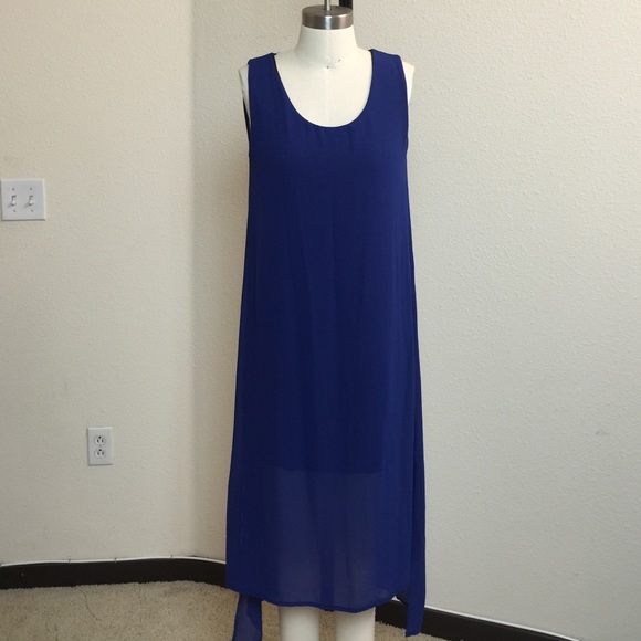 New. Sleeveless solid chiffon dress