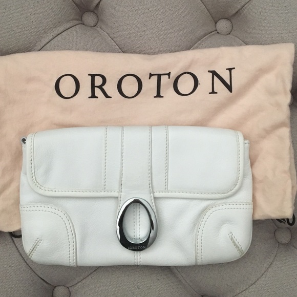Handbags - Designer white leather clutch
