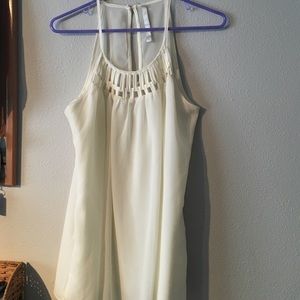 Sleeveless white blouse