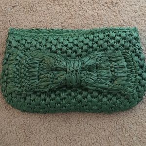 Green straw bow Kimchi Blue clutch