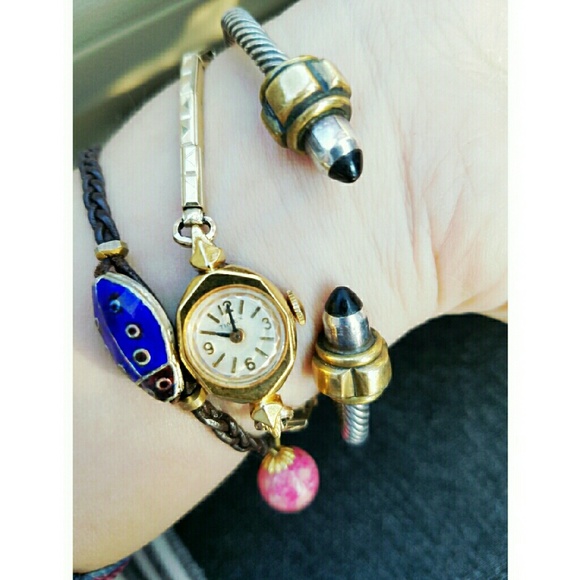 Vintage cabled bracelet with black stones at edge.