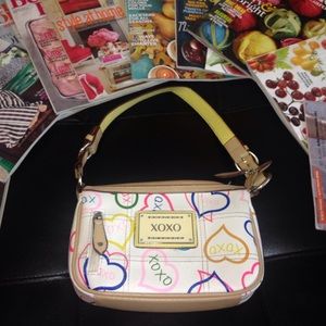 A colorful XOXO purse. Perfect for everyday use!