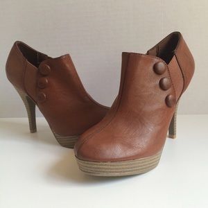 Camel colored high heel booties with button detail