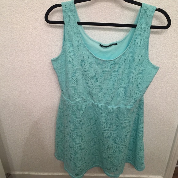 Mint colored dress.