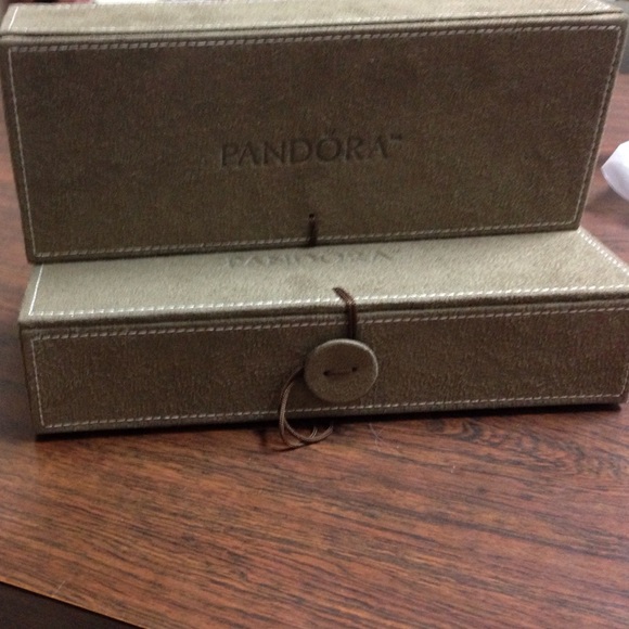Two tan suede pandora boxes