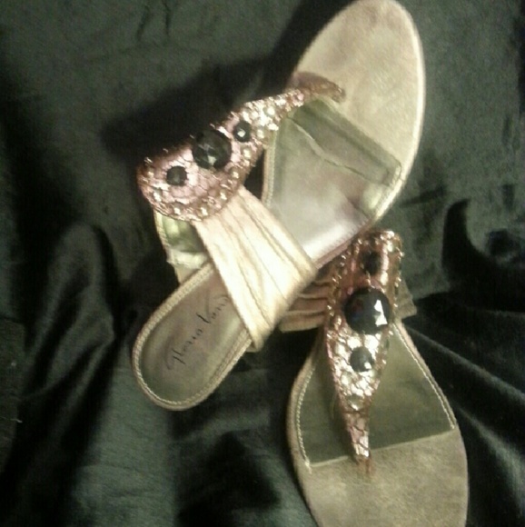 Bejeweled pewter thong-style sandal heels.