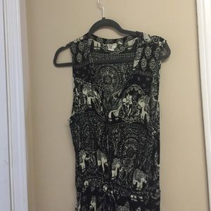 Black and cream elephant romper