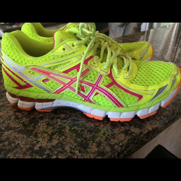 Neon yellow asics running shoes