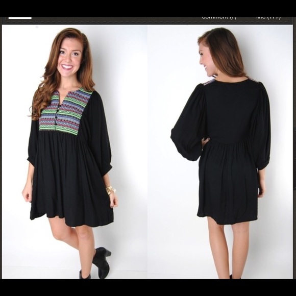 Cutie little black dress with tribal detail