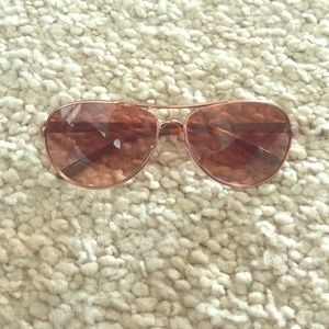 Rose gold Oakley aviator sunglasses