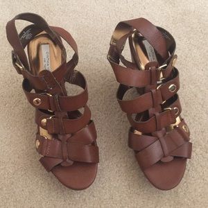 Selling this Pre loved Wedge sandal
