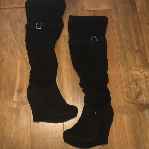 Thigh high wedged boots