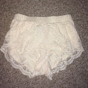 White lace shorts