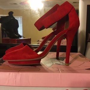 Jeffrey Campbell red suede cut out heel.