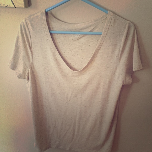 Tee with colorful specks of color