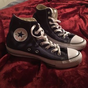 Navy blue hightop converse