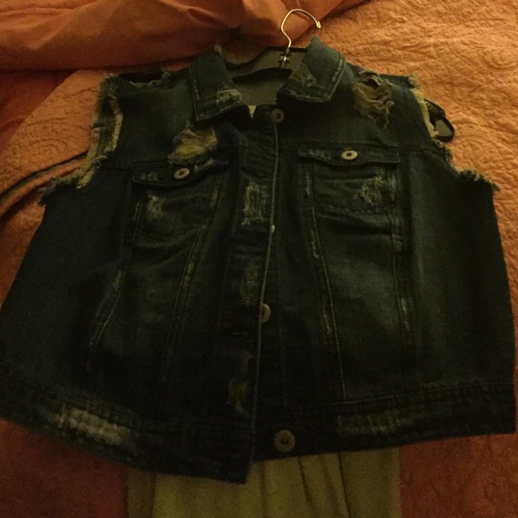 Denim vest, distressed....a real cutie....