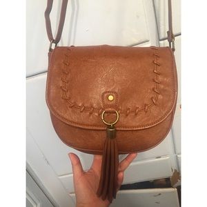 Brown express crossbody fringe bag