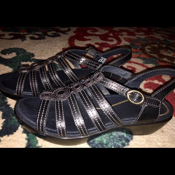 One pair of Dansko Drea Sandals.