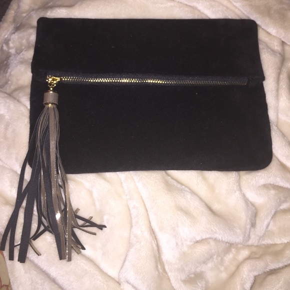 Black velvet clutch with gold and black tassels