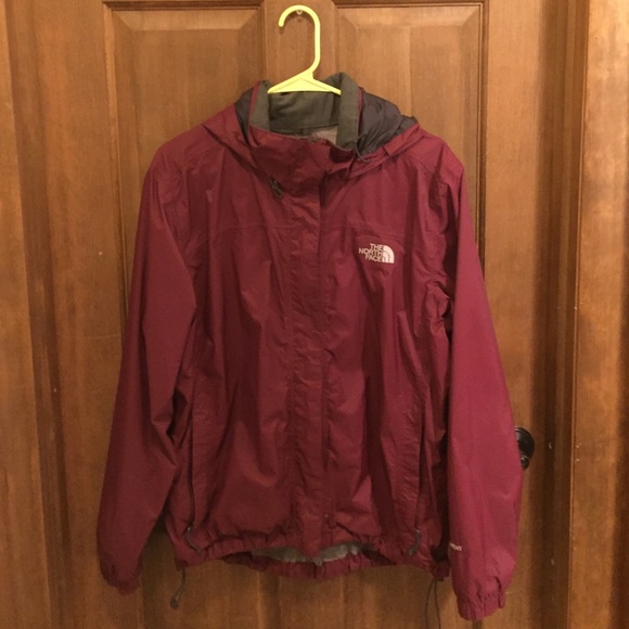 Crimson North Face windbreaker.