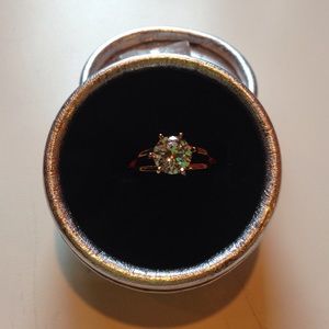 Gold plated size seven.  New in box.