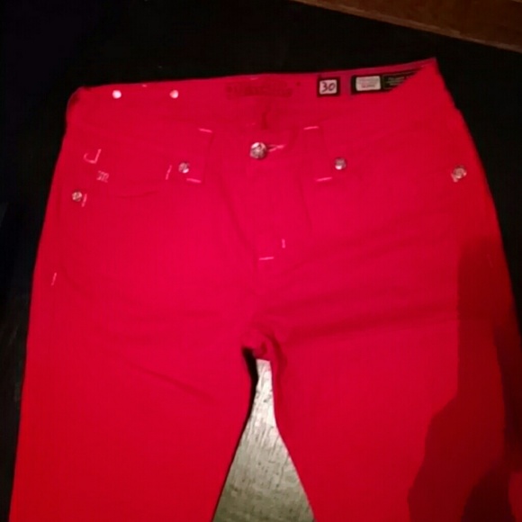 MissMe skinny jeans size 30. Bright red/orange