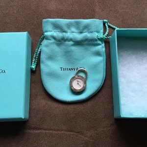 Tiffany & Co bangle and clock charm