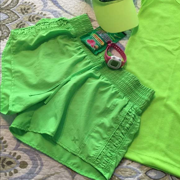 Xersion lime green ruffle side shorts